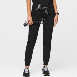 Small FIGS jogger scrub pants in black.